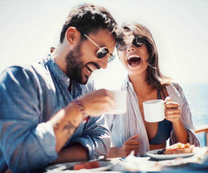 A couple dining on a cruise ship.